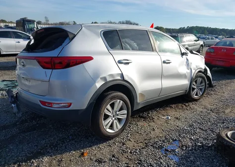 2019 Kia Sportage Lx z USA, uszkodzony, nr VIN KNDPM3ACXK7575830